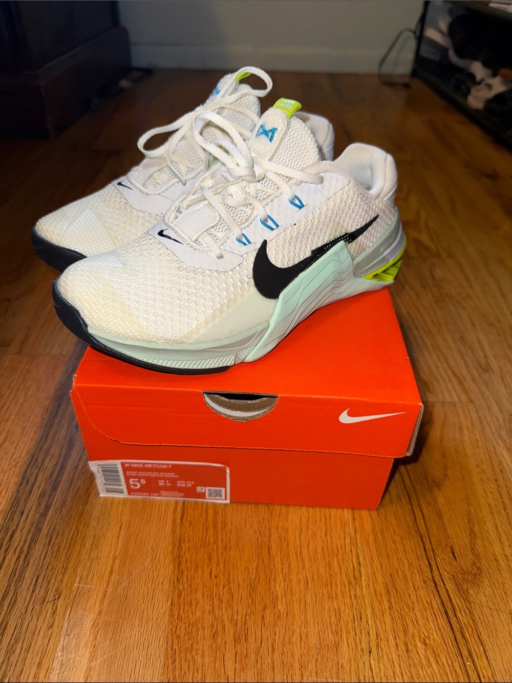 Nike Women's Metcon 7 White Black Athletic Shoes with Light Green Accents